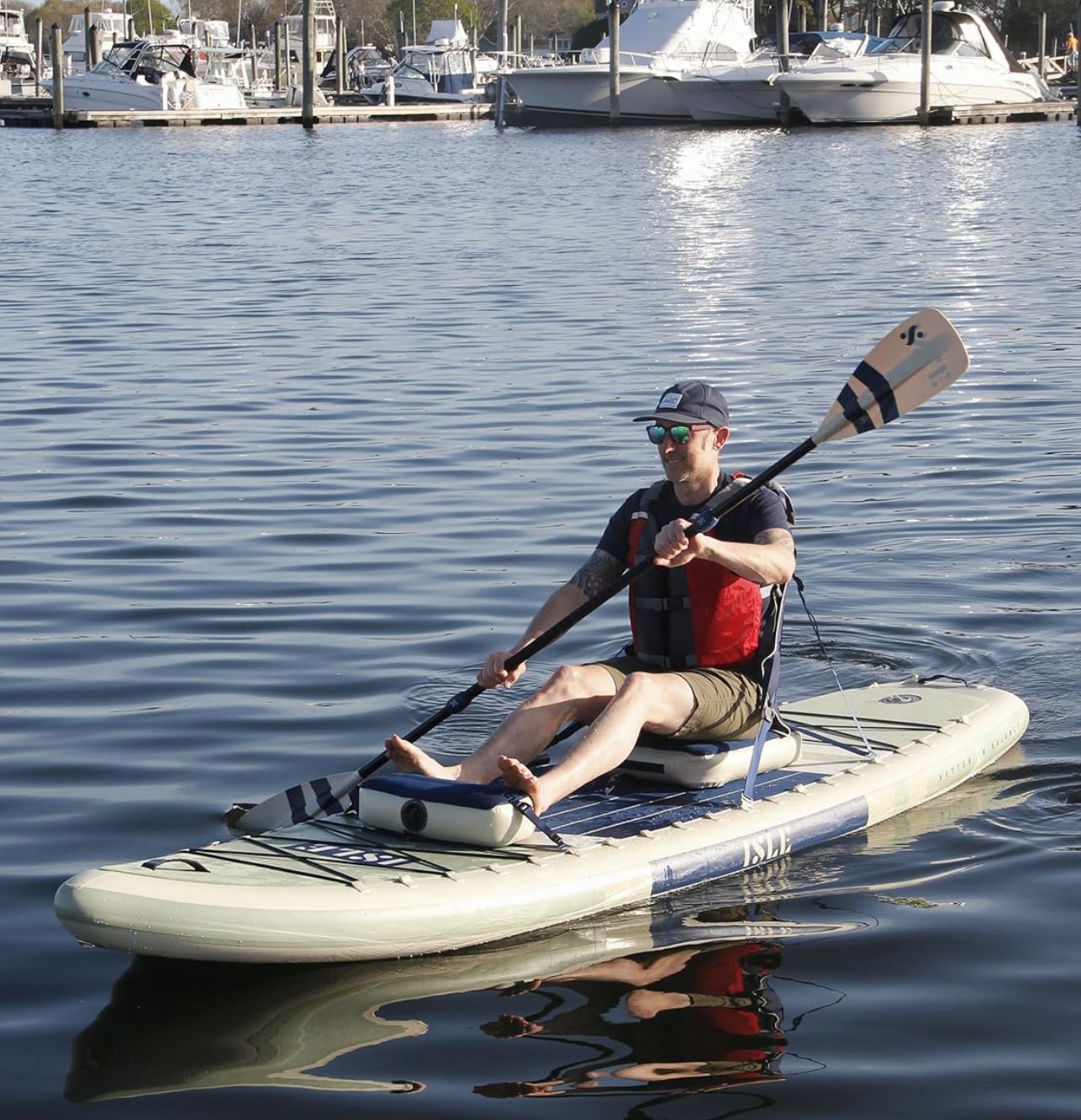 amazon isle swift paddle board man seated vert